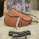 Camel leather saddle-shaped crossbody bag