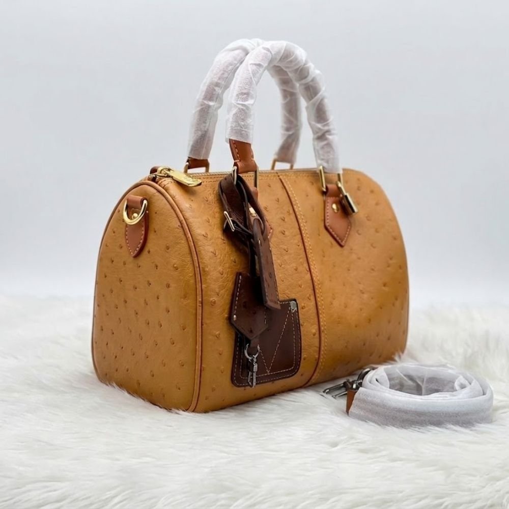Cognac Ostrich-Embossed Leather Speedy Duffle Bag with Charm Accents Cognac Ostrich-Embossed Leather Speedy Duffle Bag with Charm Accents