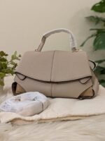 beige foded closere bag