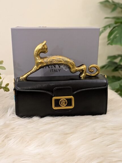 BLACK ANIMAL HANDED CLUTCH