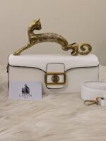 ANIMAL HANDED WHITE CLUTCH